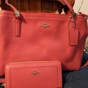 Pink coach purse with wallet included